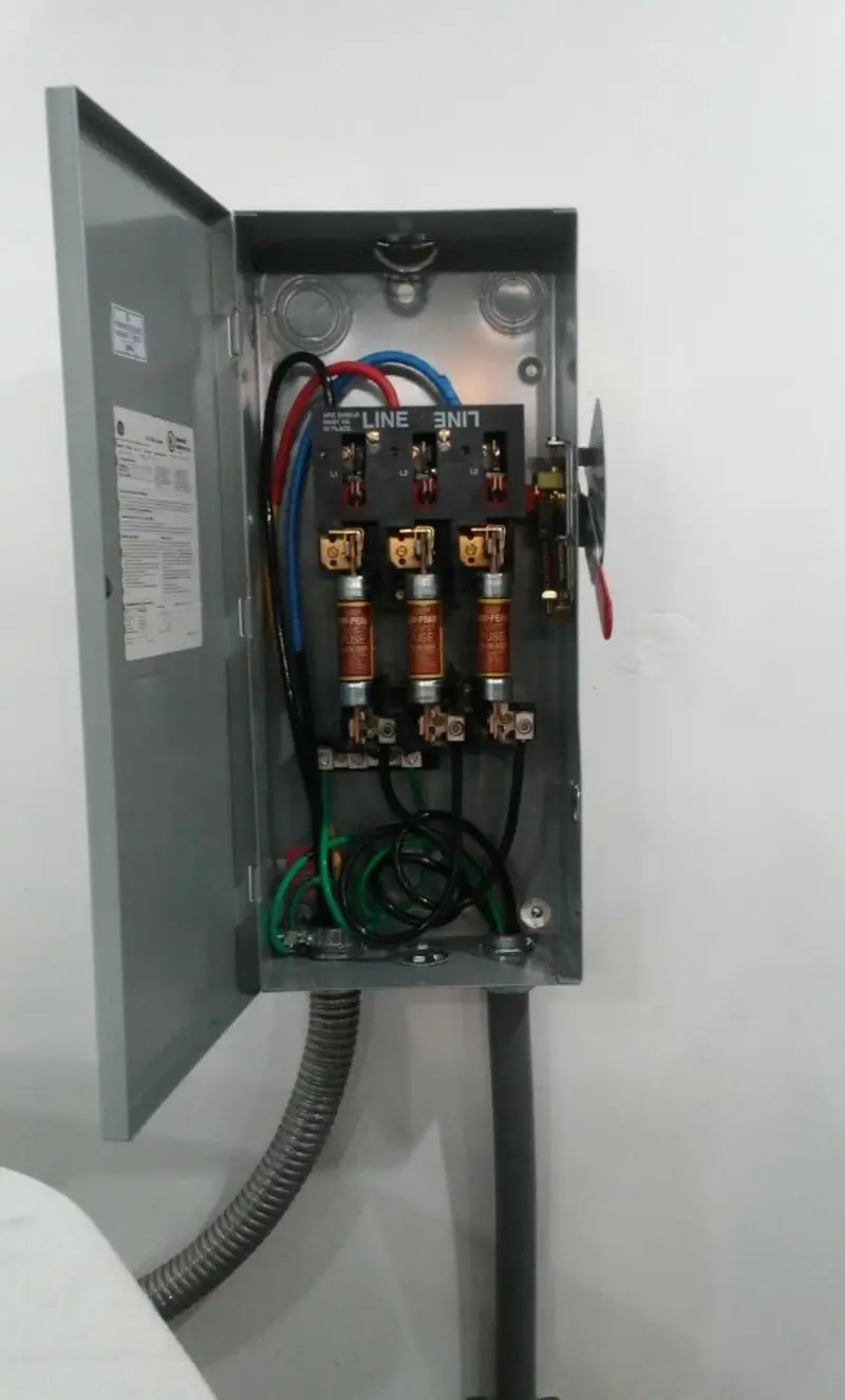 Three-phase disconnect switch installed for Smoke Detector Installation in Benson